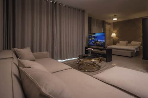 Deluxe Room, 1 Bedroom (Double) | Living area | 32-inch LCD TV with satellite channels, TV