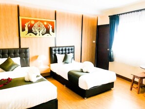 Habitación triple | Minibar, escritorio, wifi gratis