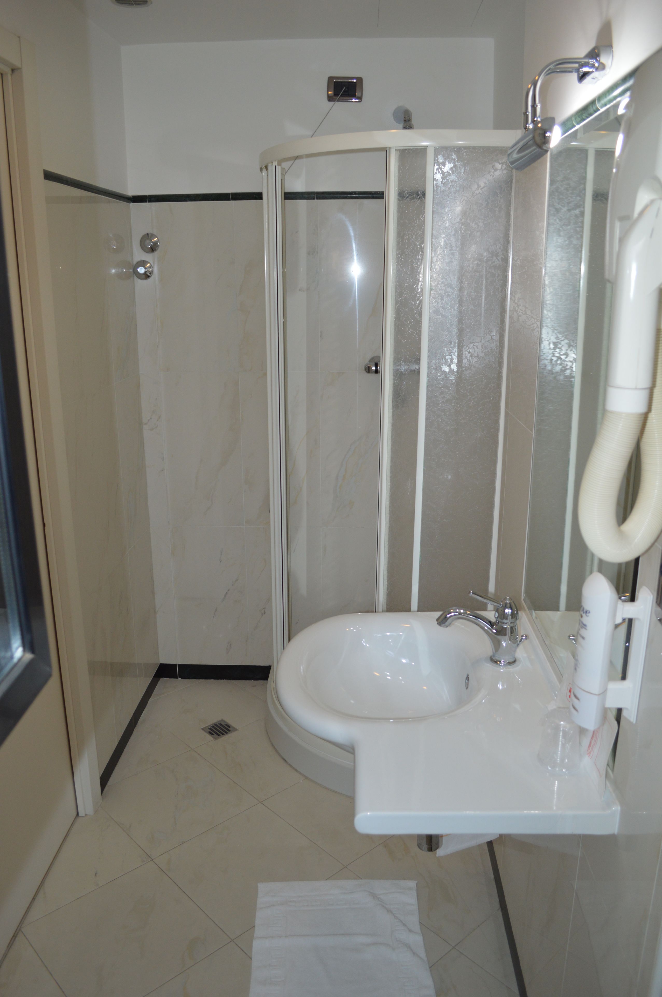 free toiletries, hair dryer, bidet, towels