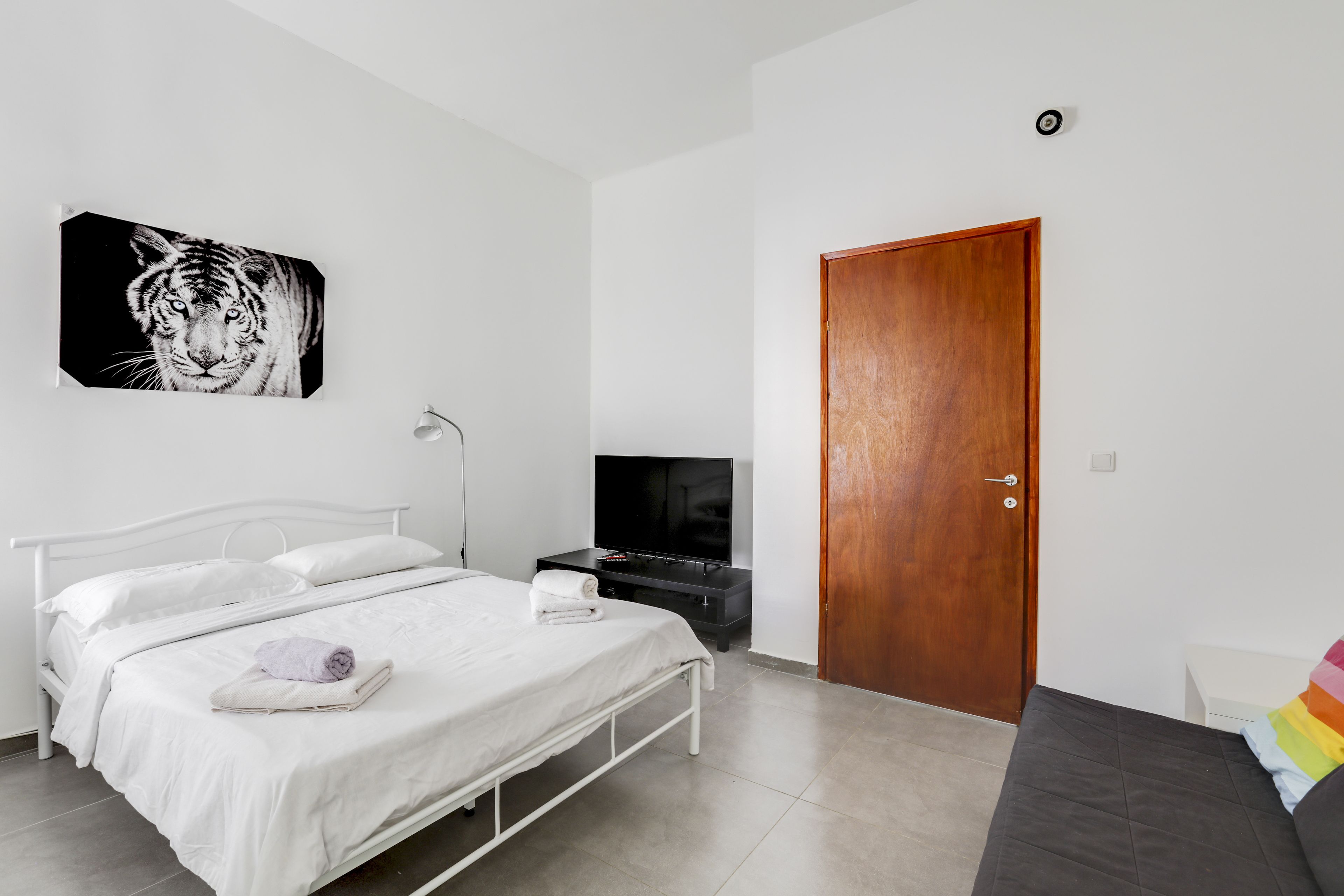 Comfort Studio | Premium bedding, desk, blackout drapes, iron/ironing board