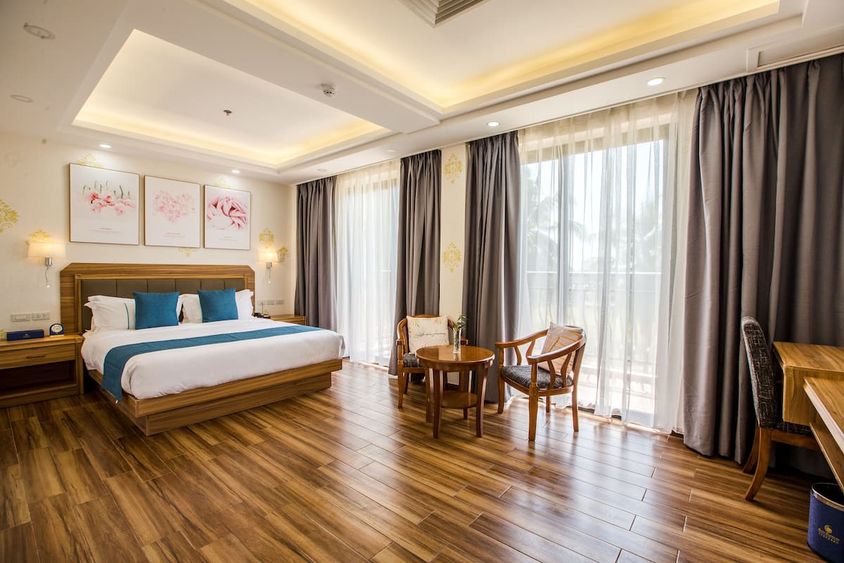 Suite Deluxe | 1 dormitorio, minibar, caja fuerte y decoración individual