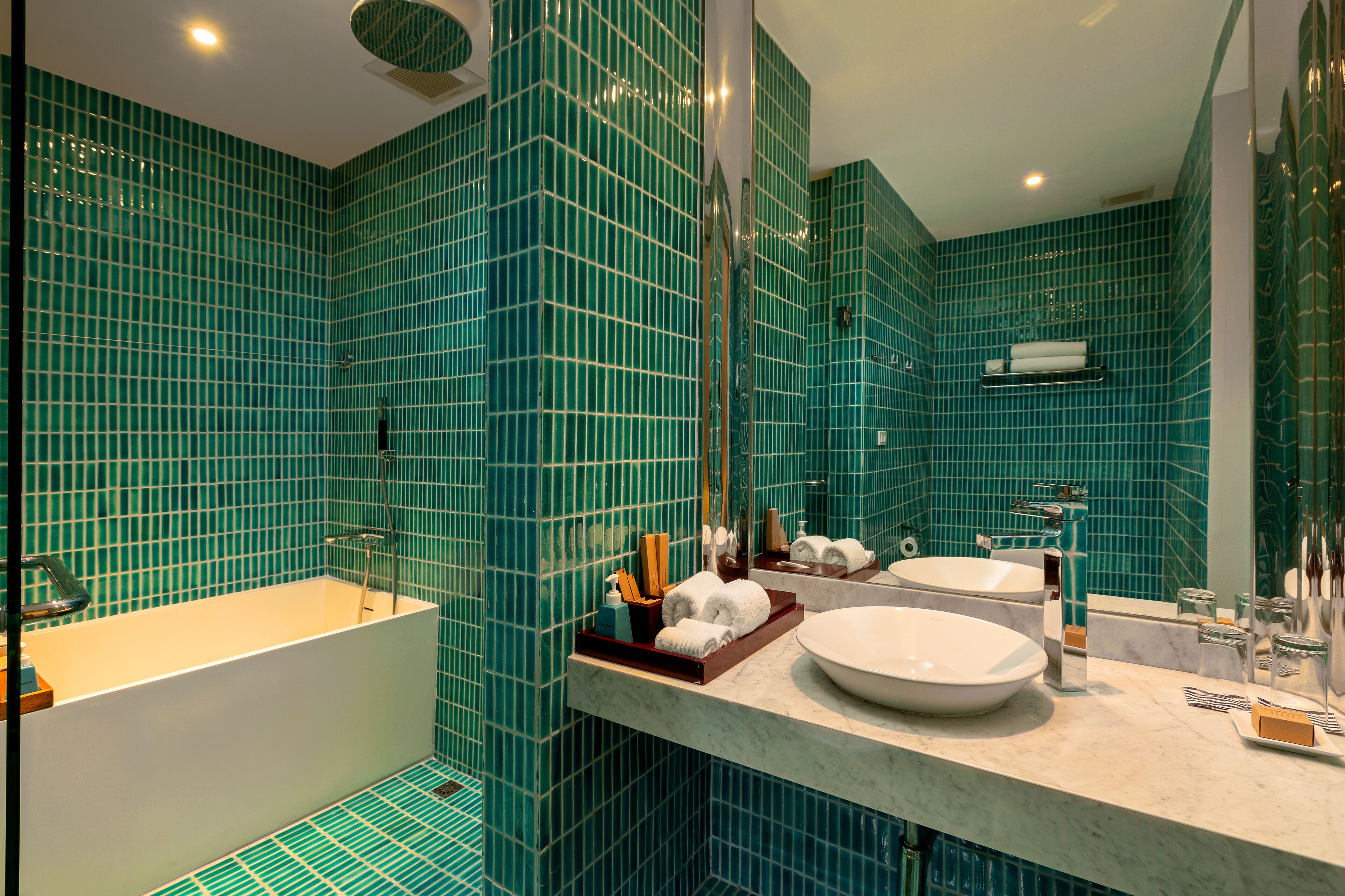 ocean suite | bathroom | shower, eco-friendly toiletries, bathrobes, slippers