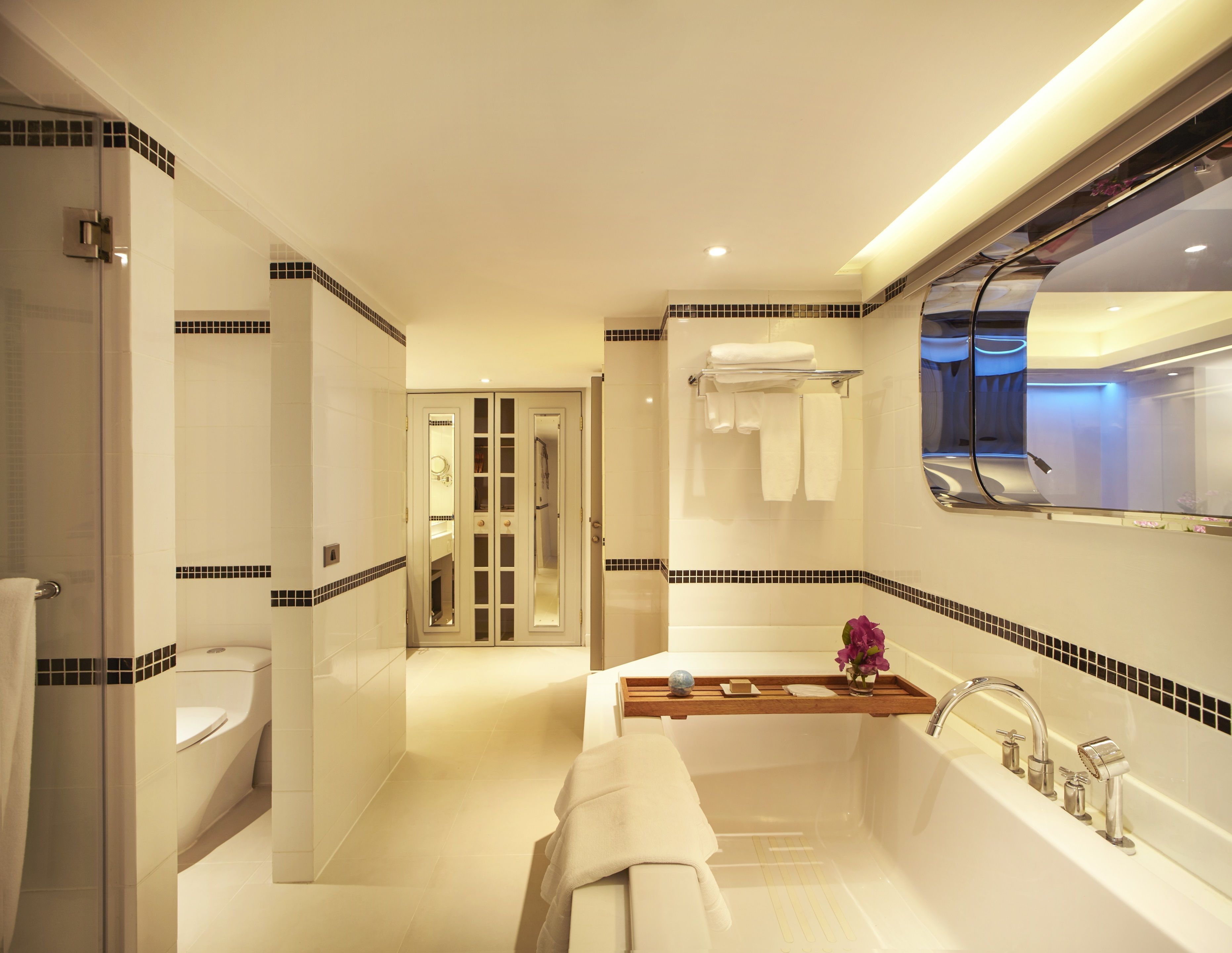 junior suite | bathroom | shower, eco-friendly toiletries, bathrobes, slippers