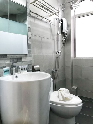 Shower, free toiletries, hair dryer, towels
