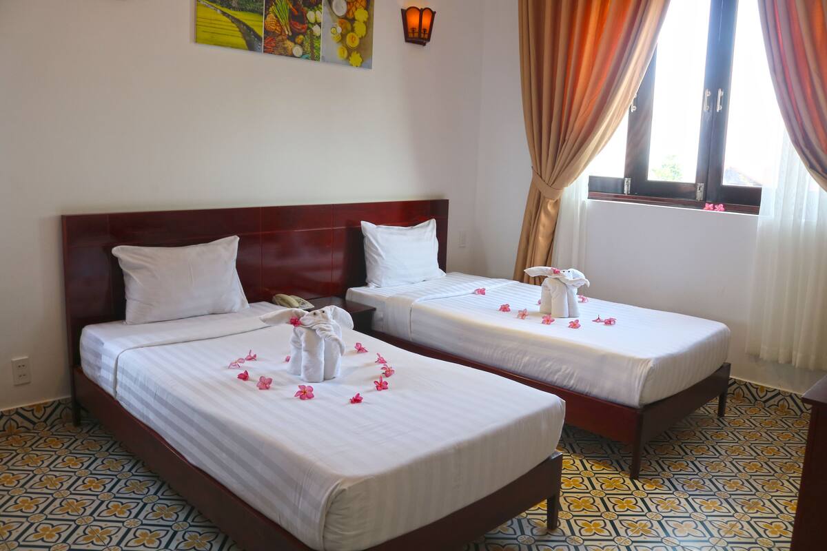 Phòng Deluxe, 1 giường đôi hoặc 2 giường đơn, quang cảnh biển | Bộ đồ giường cao cấp, minibar, két bảo mật tại phòng, bàn