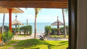 Bungalow, Beachfront (Honey) | Premium bedding, minibar, in-room safe, desk