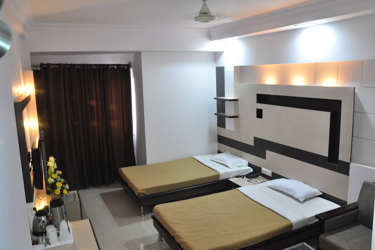 Executive Double Room | In-room safe, desk, iron/ironing board, individually decorated