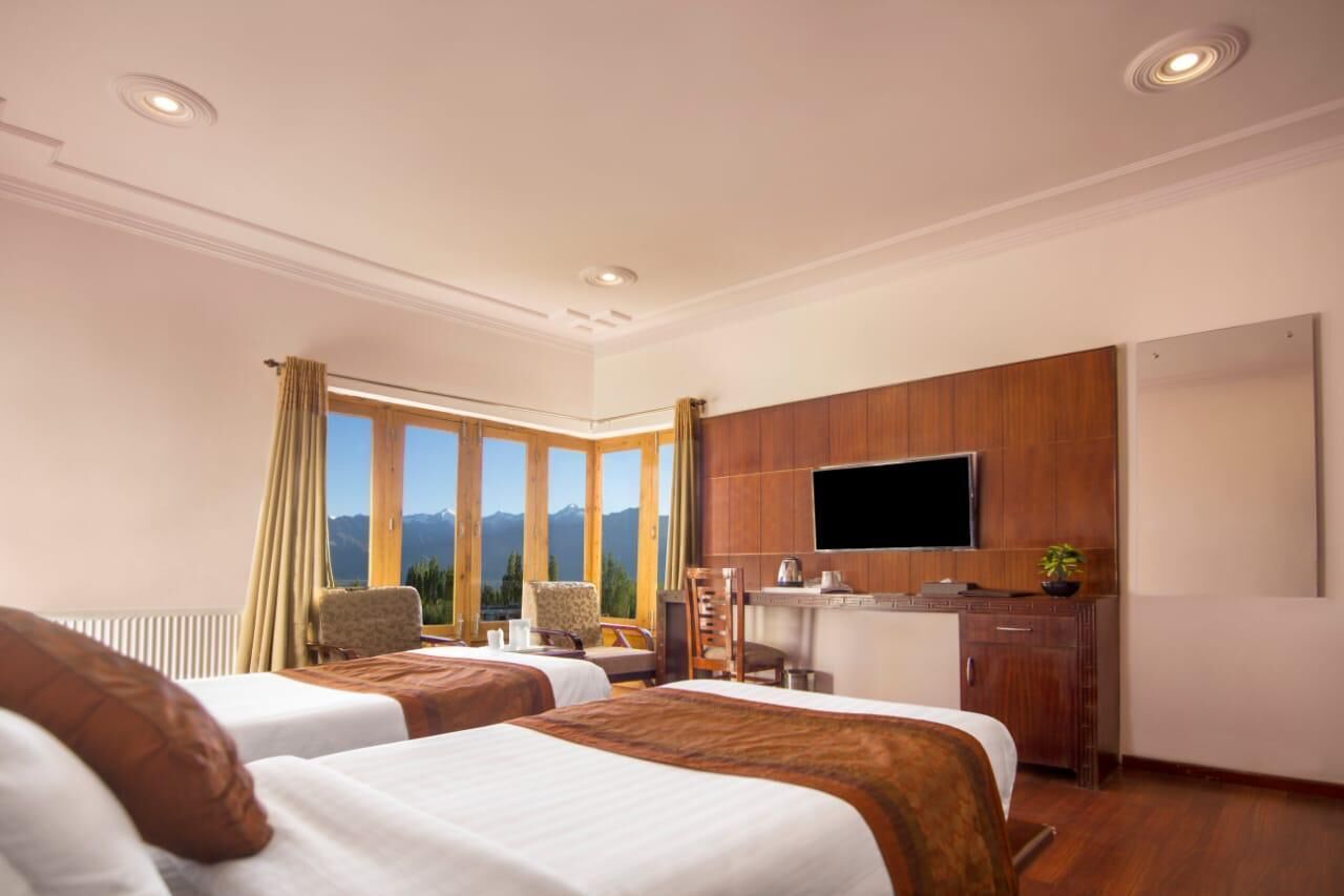 Desk, blackout drapes, soundproofing, rollaway beds