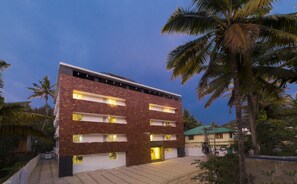 Front of property - evening/night - Summit Hampton Hotel (Peerumade)
