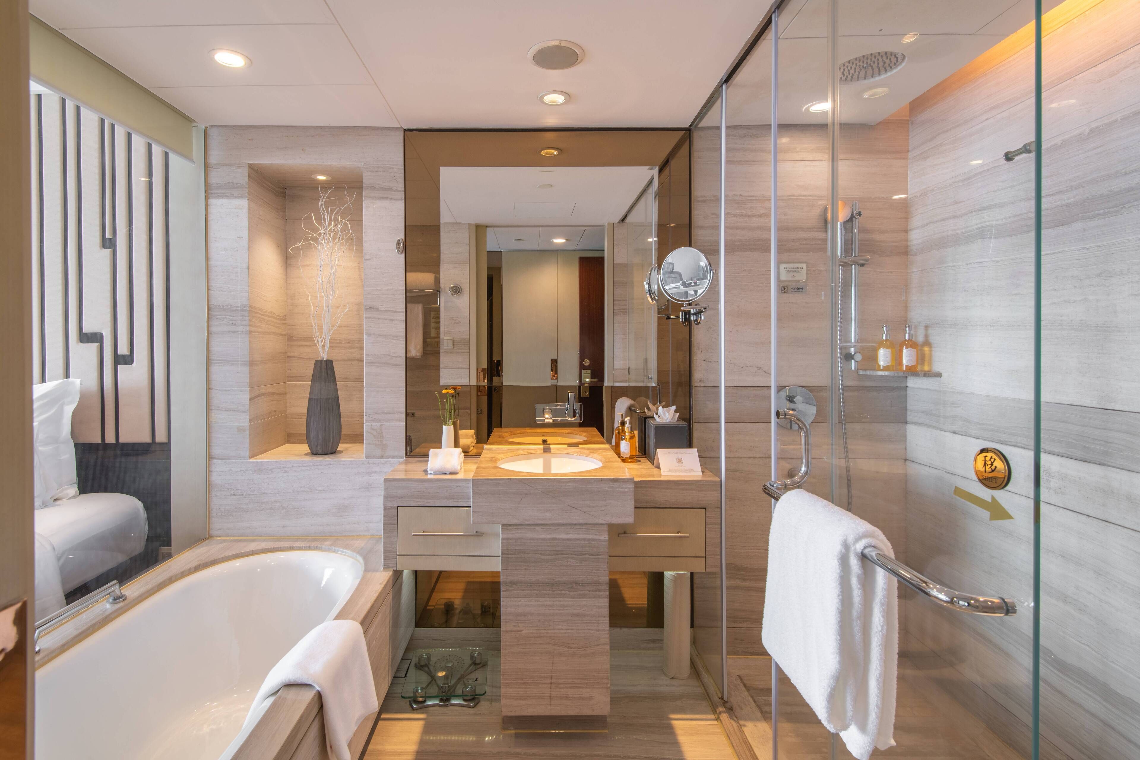 separate bathtub and shower, free toiletries, hair dryer, bathrobes