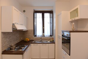 Apartamento, 1 quarto | Cozinha privada | Geladeira, máquina de café expresso