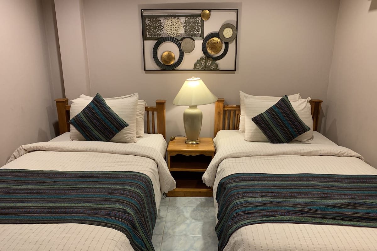 Economy Room | Desk, laptop workspace, blackout drapes, free WiFi