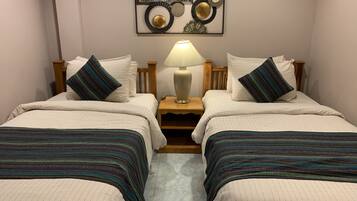 Economy Room | Desk, laptop workspace, blackout drapes, free WiFi