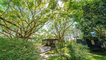 Standard Quadruple Room, Garden View | Terrace/patio