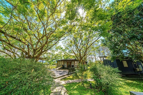 Standard Quadruple Room, Garden View | Terrace/patio