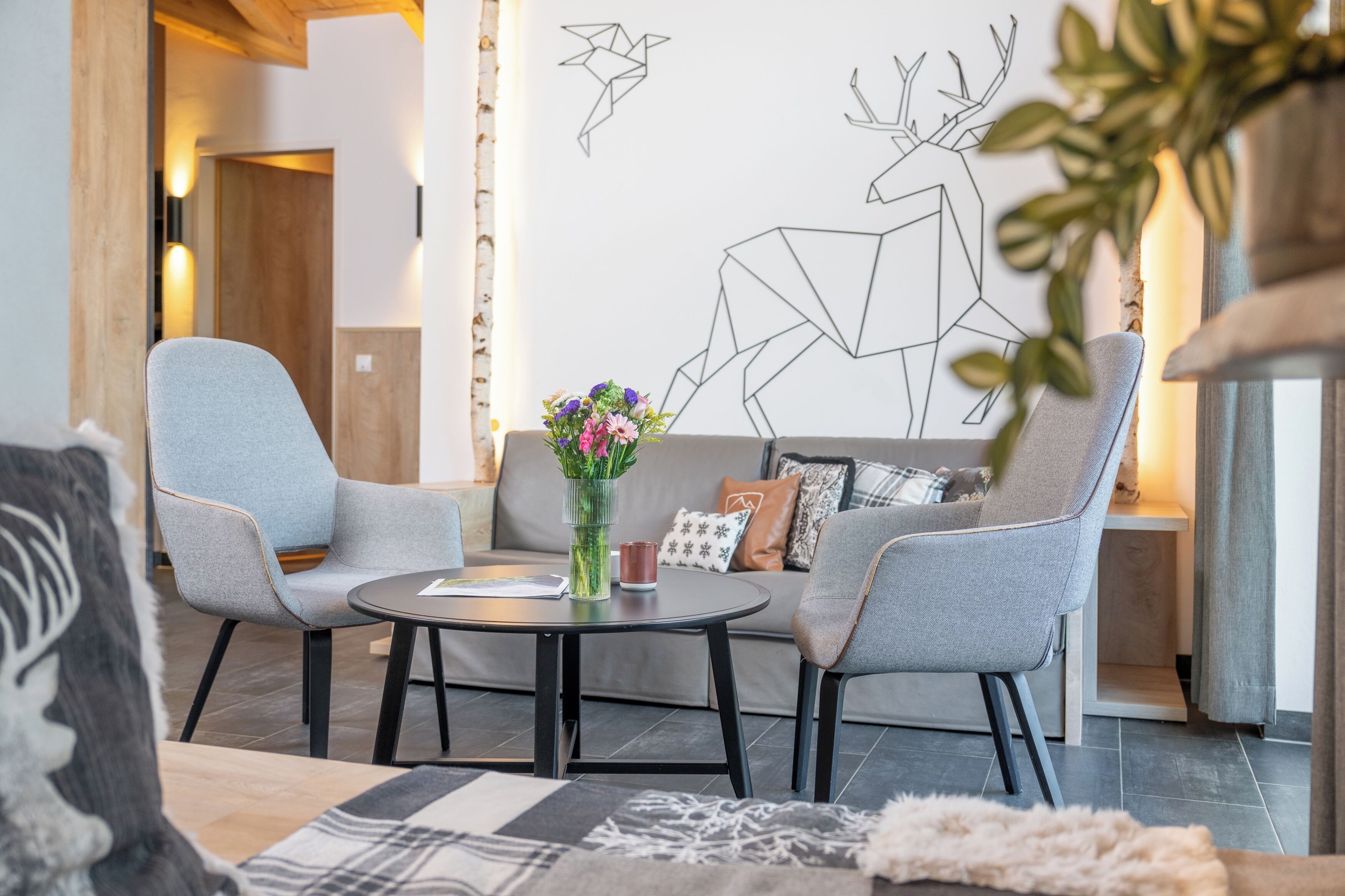 deluxe penthouse, 3 bedrooms, sauna | living area | flat-screen tv