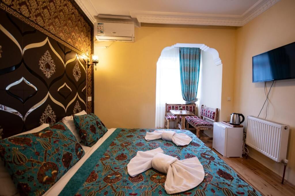 Luxe beddengoed, een kluis op de kamer, geluiddichte muren