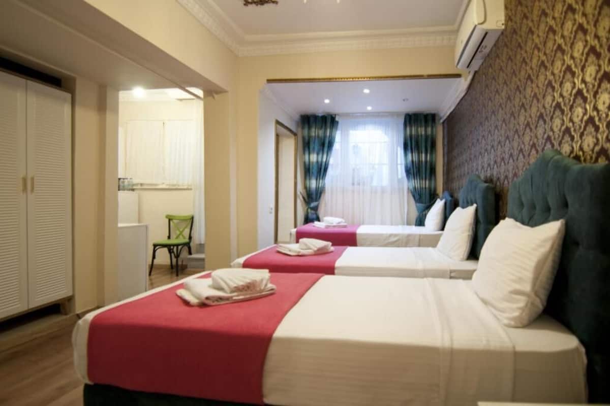 Economy kamer | Luxe beddengoed, een kluis op de kamer, geluiddichte muren