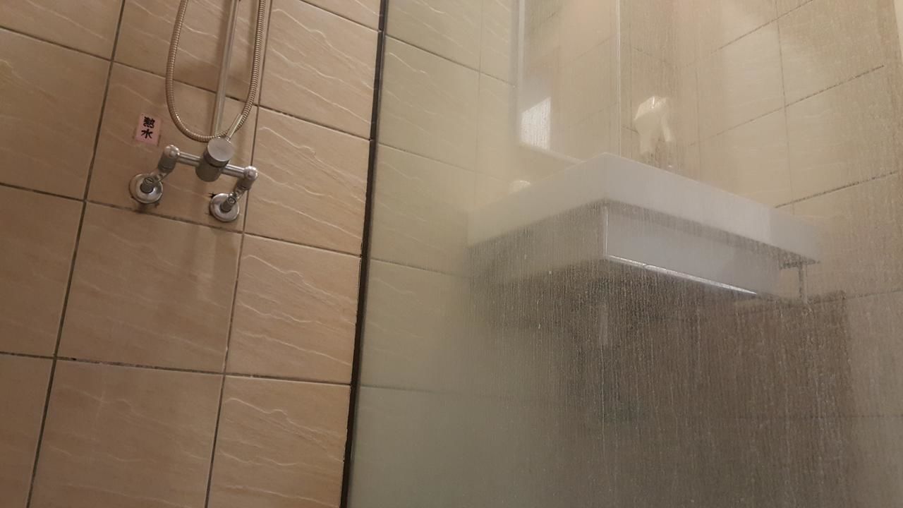 Shower, free toiletries, hair dryer, slippers