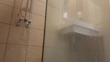 Shower, free toiletries, hair dryer, slippers
