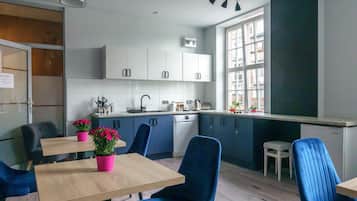 Fridge, stovetop, electric kettle, cookware/dishes/utensils