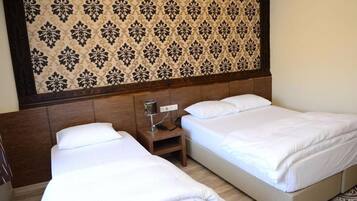 Familiekamer | Een bureau, een strijkplank/strijkijzer, gratis wifi