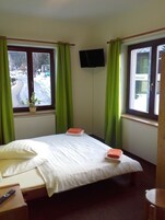 Double Room | Blackout drapes, iron/ironing board, cribs/infant beds, free WiFi