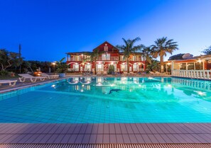 Seasonal outdoor pool, pool umbrellas, pool loungers