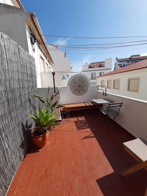Double room S w/shared wc and balcony | Terrace/patio