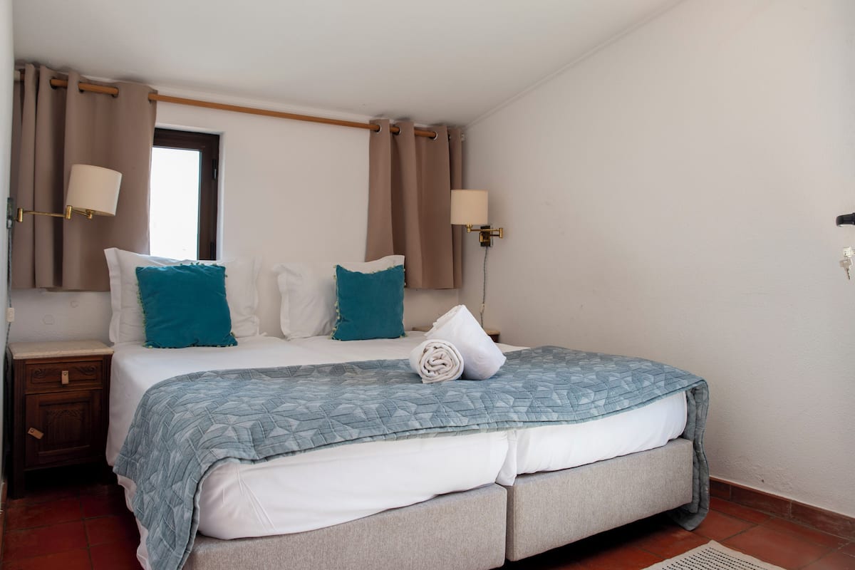Family room with 2 connecting rooms and Balcony