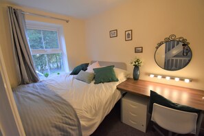 Desk, free WiFi, bed sheets