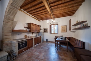 Family Apartment, 2 Bedrooms | Living room | Flat-screen TV - Agriturismo Natura e Salute (San Gimignano)