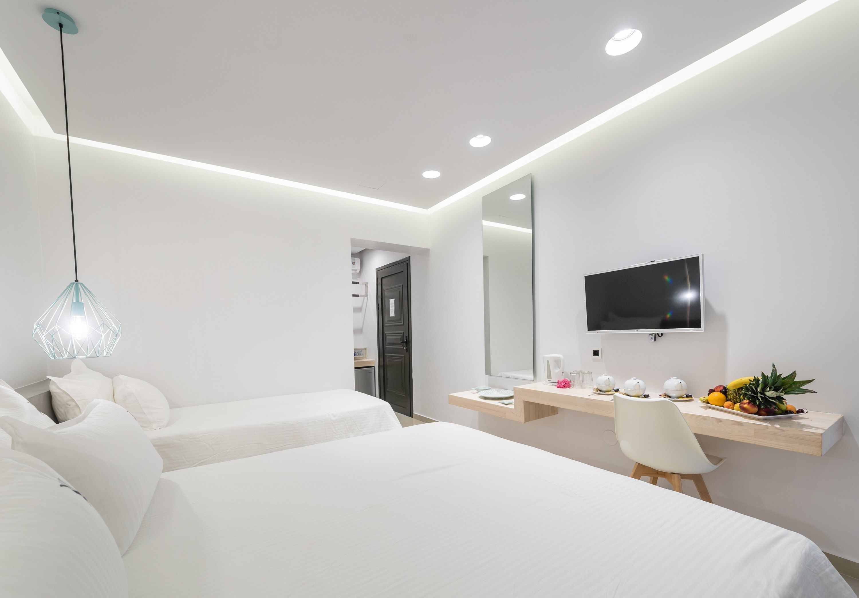 deluxe triple room | in-room safe, iron/ironing board, free wifi, bed sheets