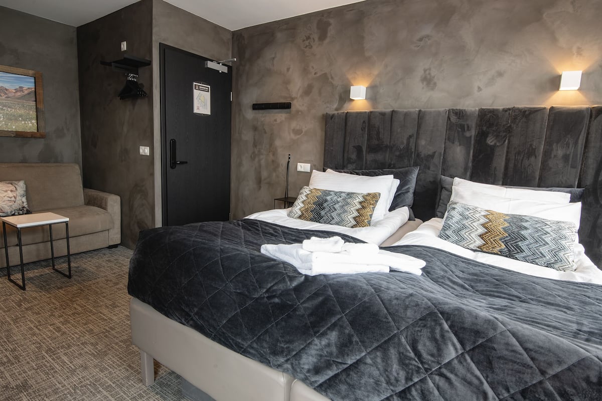 Premium bedding, pillowtop beds, blackout drapes, free WiFi