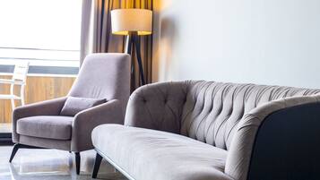 Luxury Room, 1 Bedroom | Living area | LCD TV