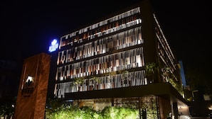 A modern building with a sign that reads "Hotel". - Levana Suites (Lucknow)