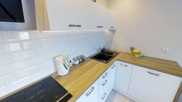 Apartment, Balcony (Suraska 6) | Private kitchenette | Fridge, microwave, electric kettle, cookware/dishes/utensils