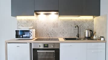 Apartament | Cuina privada | Frigorífic, microones, forn i placa de cuina