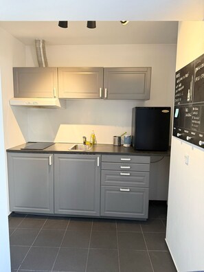 Familie studio | Een bureau, verduisterende gordijnen, gratis wifi, beddengoed