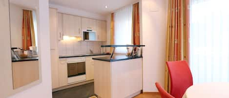 Apartment, 1 Bedroom | 1 bedroom, desk, iron/ironing board, free cribs/infant beds