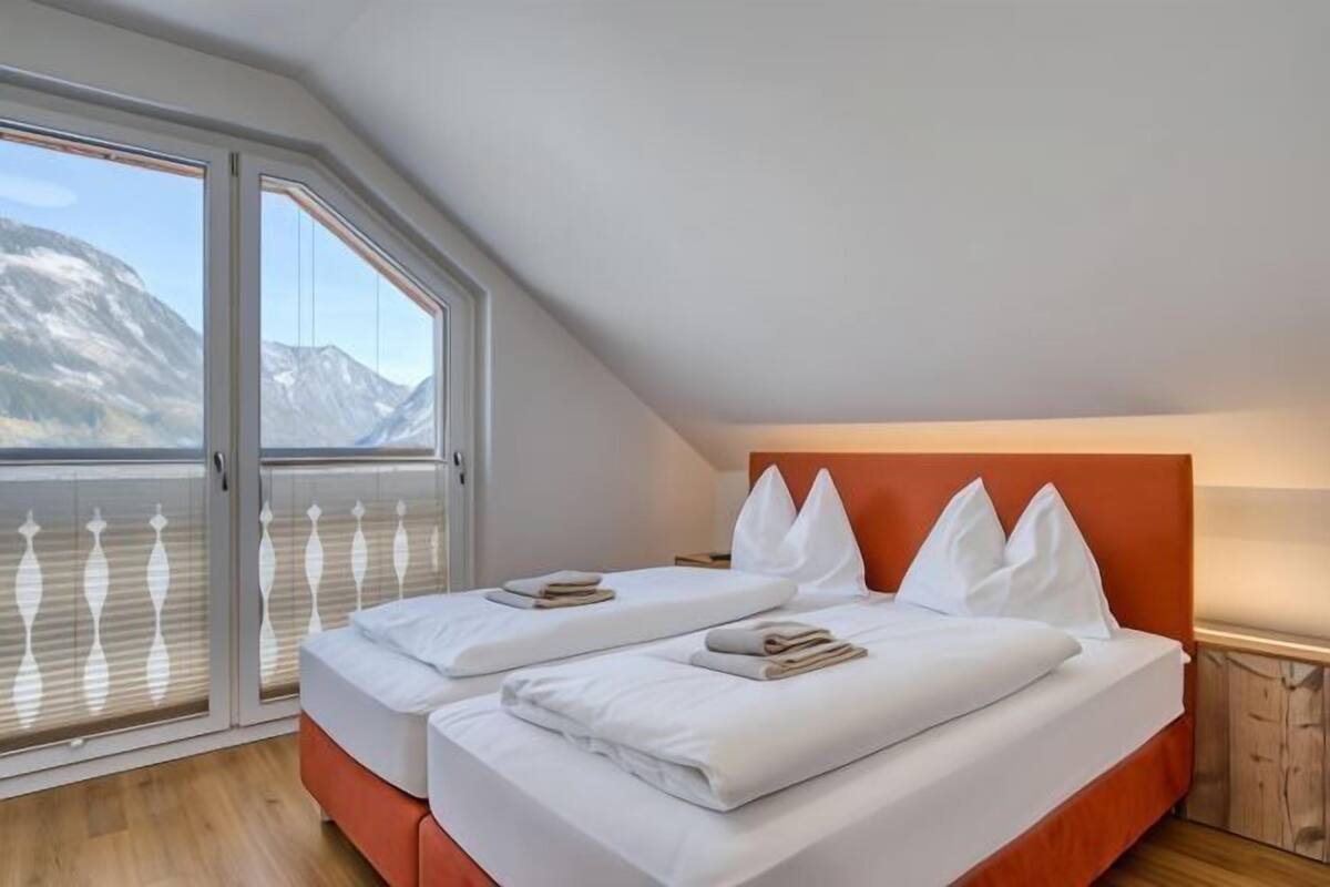 5 habitaciones, ropa de cama hipoalergénica y cortinas blackout