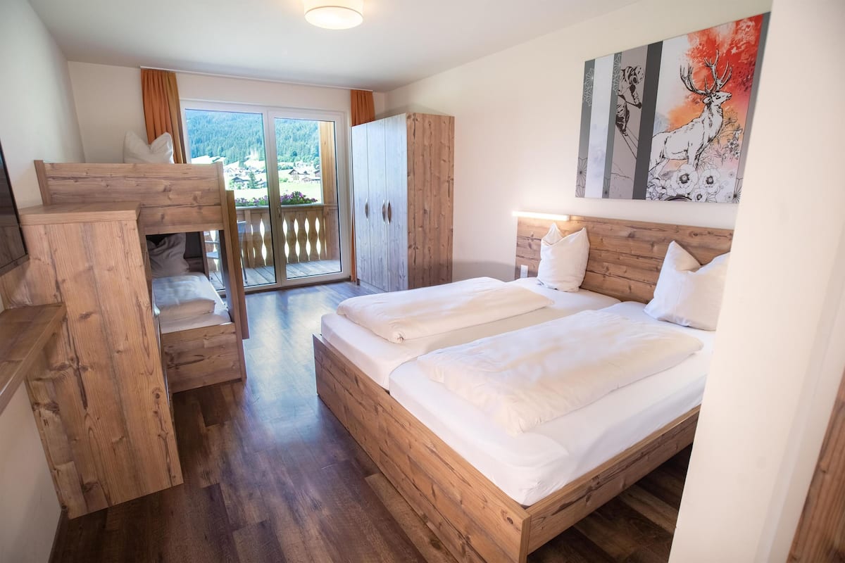 Superior Quadruple Room, Multiple Beds, Balcony, Mountain View | Hypo-allergenic bedding available, blackout drapes, WiFi (free)