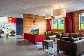 Lobby - COOEE alpin Hotel Kitzbüheler Alpen (Sankt Johann in Tirol)