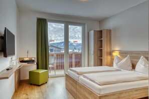 Standard Double Room, 2 Single Beds, Balcony, Mountain View | Hypo-allergenic bedding, blackout curtains, soundproofing, free WiFi - COOEE alpin Hotel Kitzbüheler Alpen (Sankt Johann in Tirol)