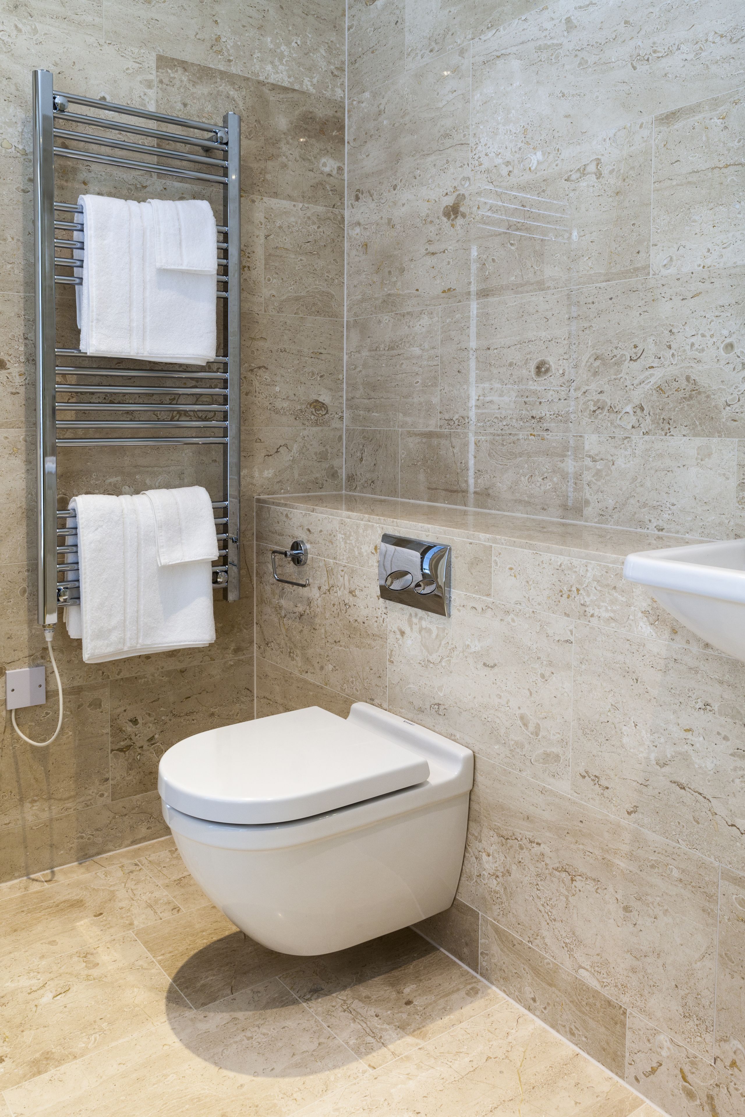 shower, designer toiletries, hair dryer, towels