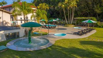 2 indoor pools, outdoor pool, open 9:00 AM to 8:00 PM, pool umbrellas