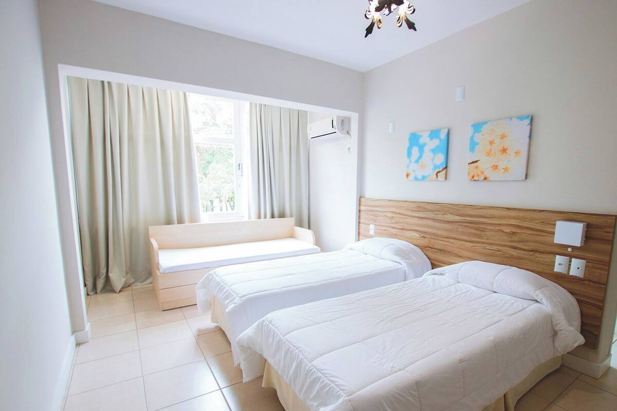 Minibar, desk, blackout curtains, iron/ironing board