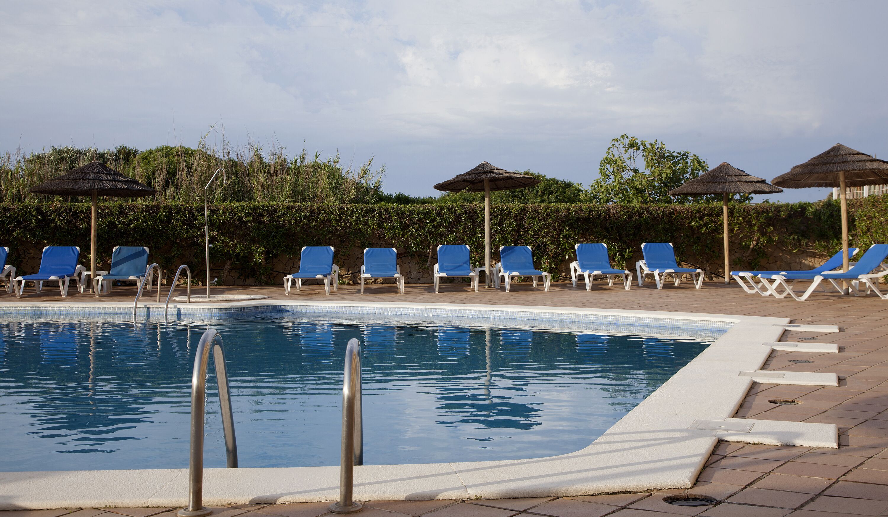 2 outdoor pools, open 9:00 am to 7:00 pm, pool umbrellas, pool loungers