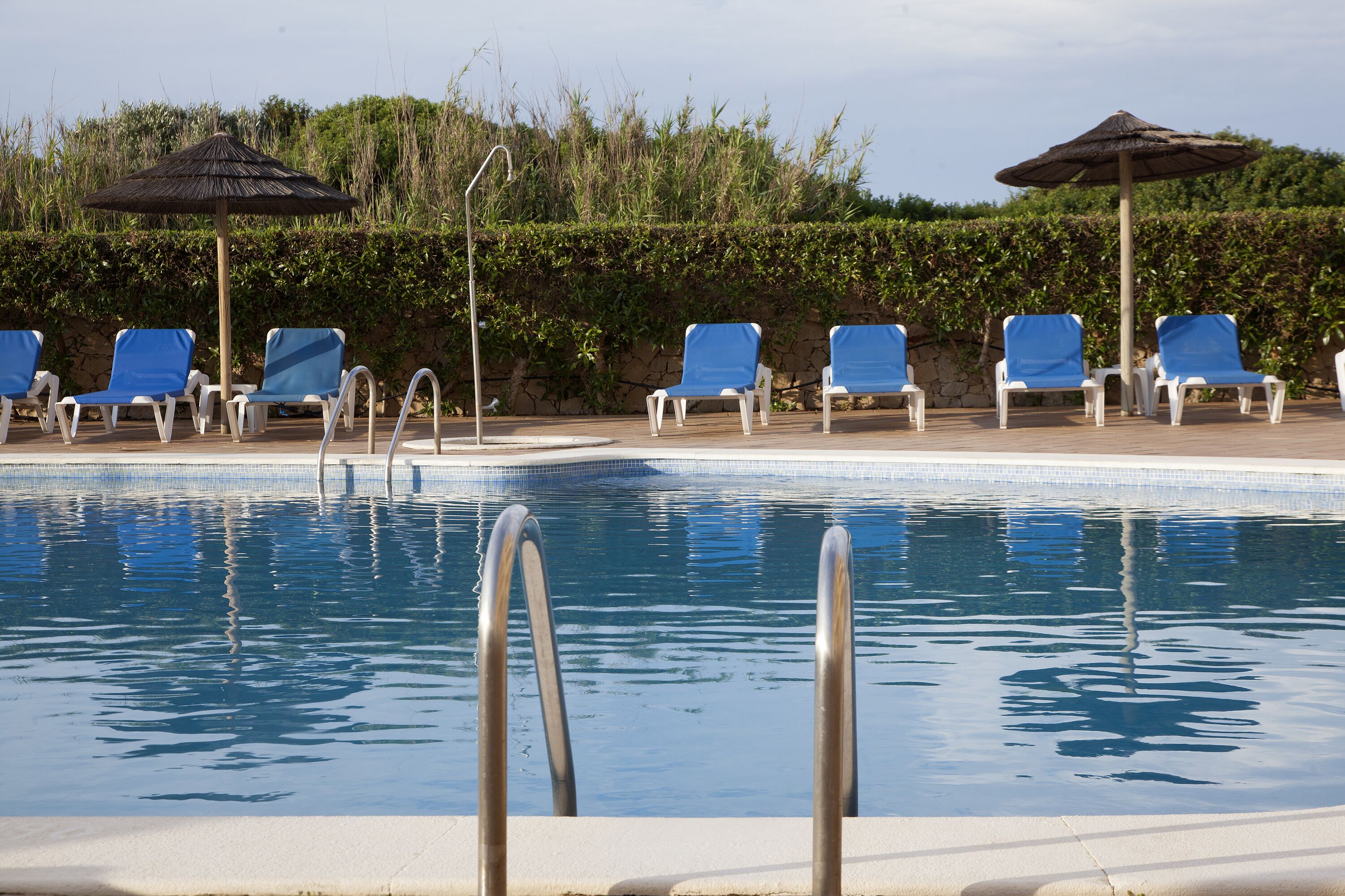 2 outdoor pools, open 9:00 am to 7:00 pm, pool umbrellas, pool loungers