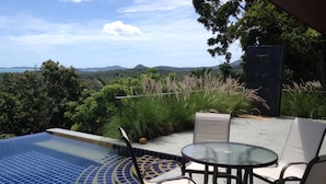 An outdoor pool area with a view of hills and trees. - 2 Bedroom Seaview Villa Laurenz (Koh Samui)